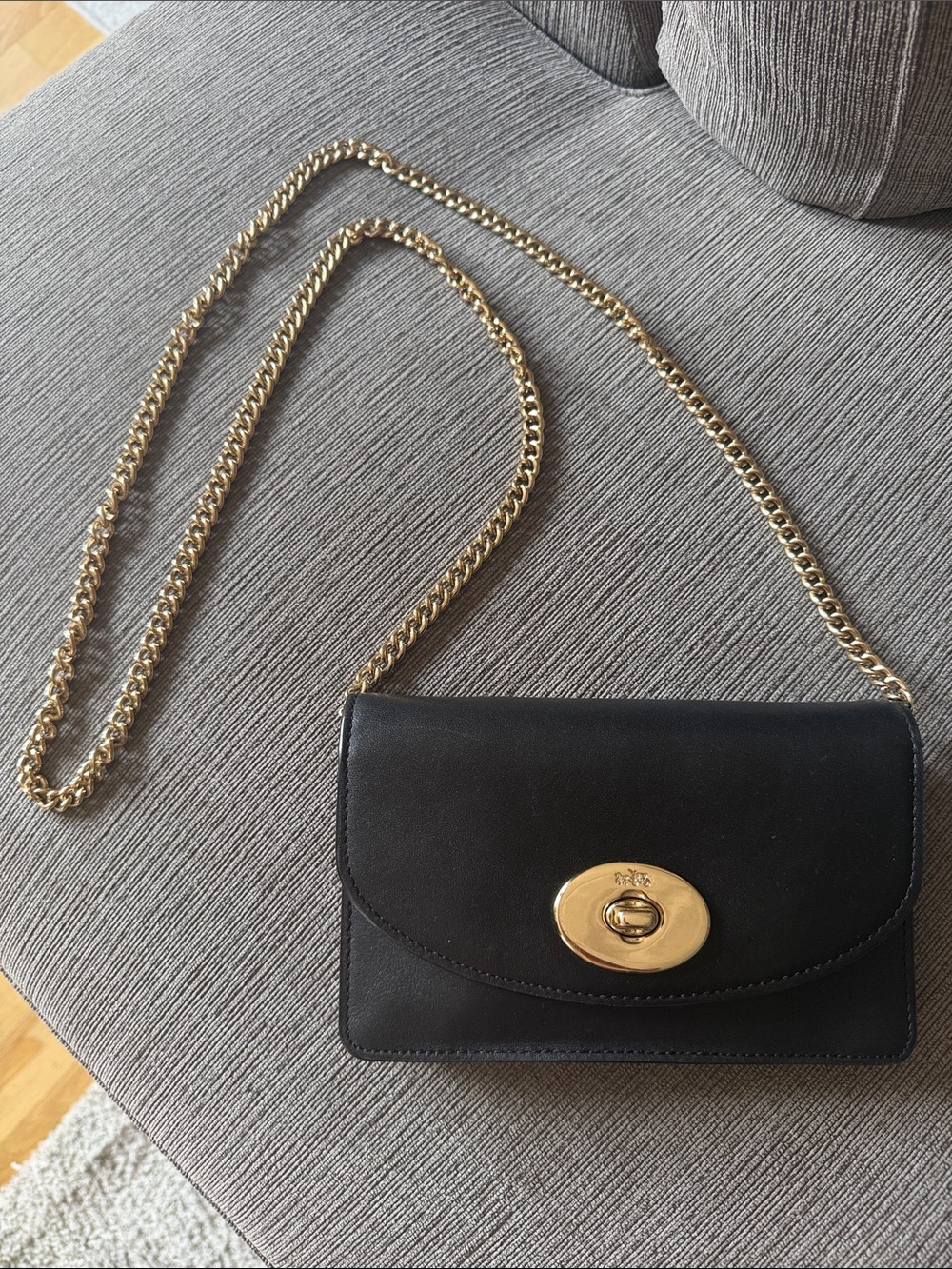 Coach Black Leather Crossbody with Gold Turnlock and Chain